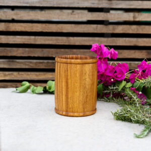 Handcrafted NG Rosewood utensil holder made from a single piece of solid timber, designed to neatly organize kitchen utensils and add natural warmth to your kitchen.